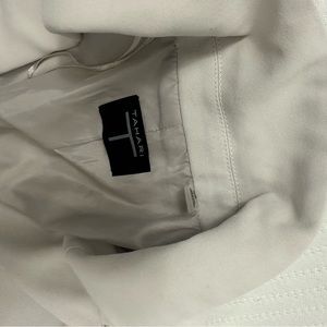 Suit light grey. Only worn once